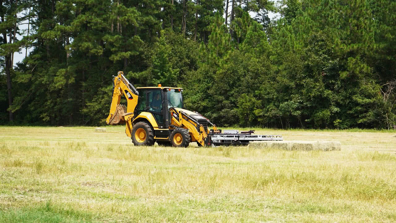 KN615 Tie-Grabber in action with Backhoe